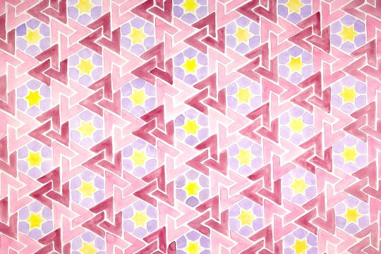 Geometric patterns of red, pink, purple and yellow.