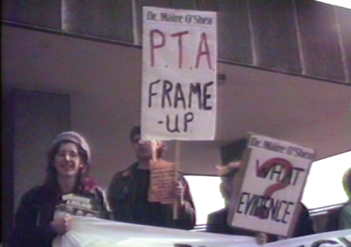 group holding picket signs