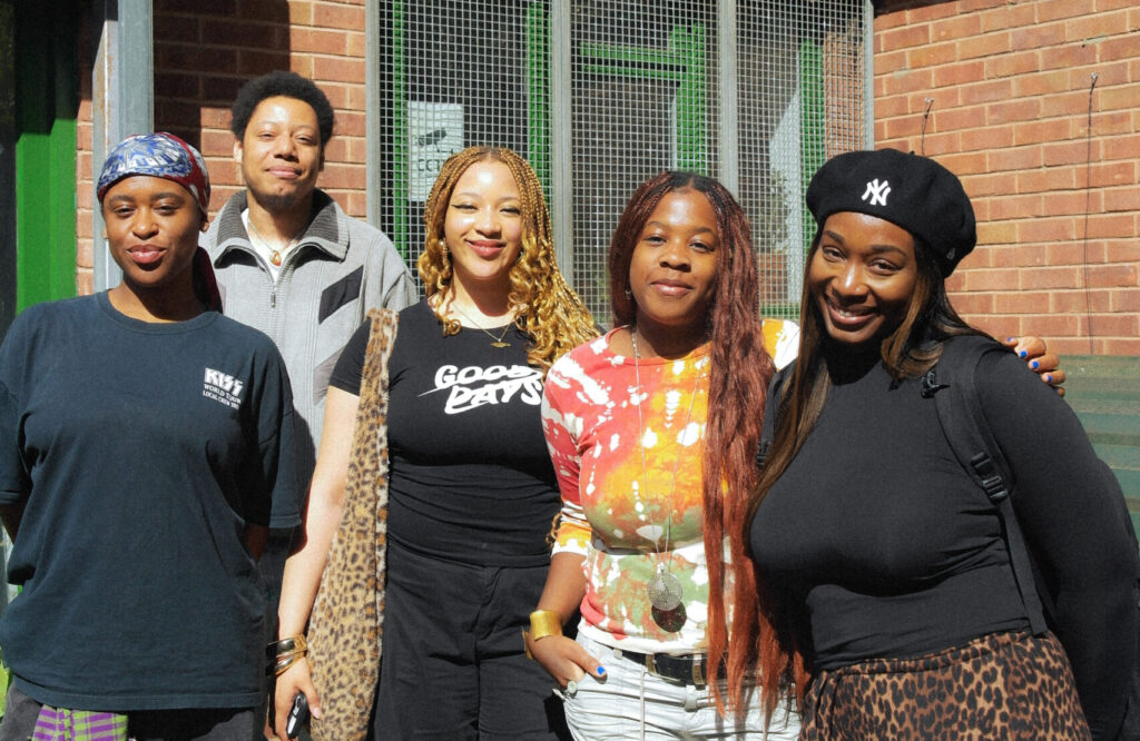 okcandice, Amir KDZ, Samara Danielle, Danielle Ncube and Yassmin Turner (left to right) pictured standing outside of the Friends of The Earth building.
